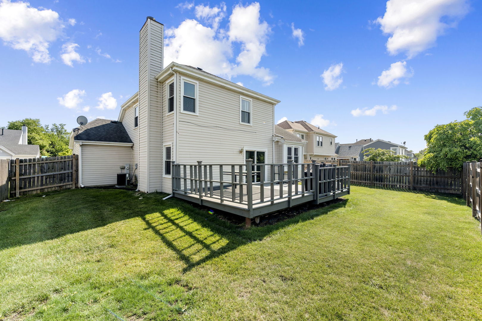 24 Fillmore Lane Streamwood, IL 60107 - Photo 29 of 35 a view of a house with a yard in a backyard