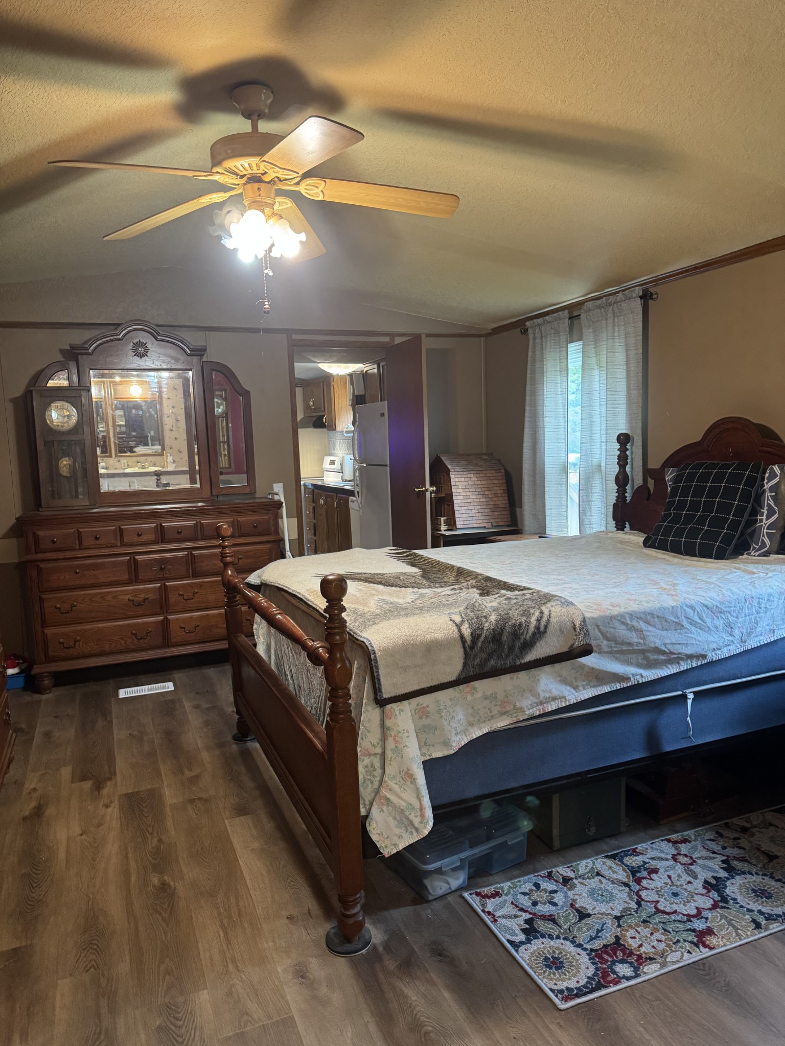 79 Sharps Lane Beechgrove, TN 37018 - Photo 11 of 29 a large bedroom with a bed and wooden floor