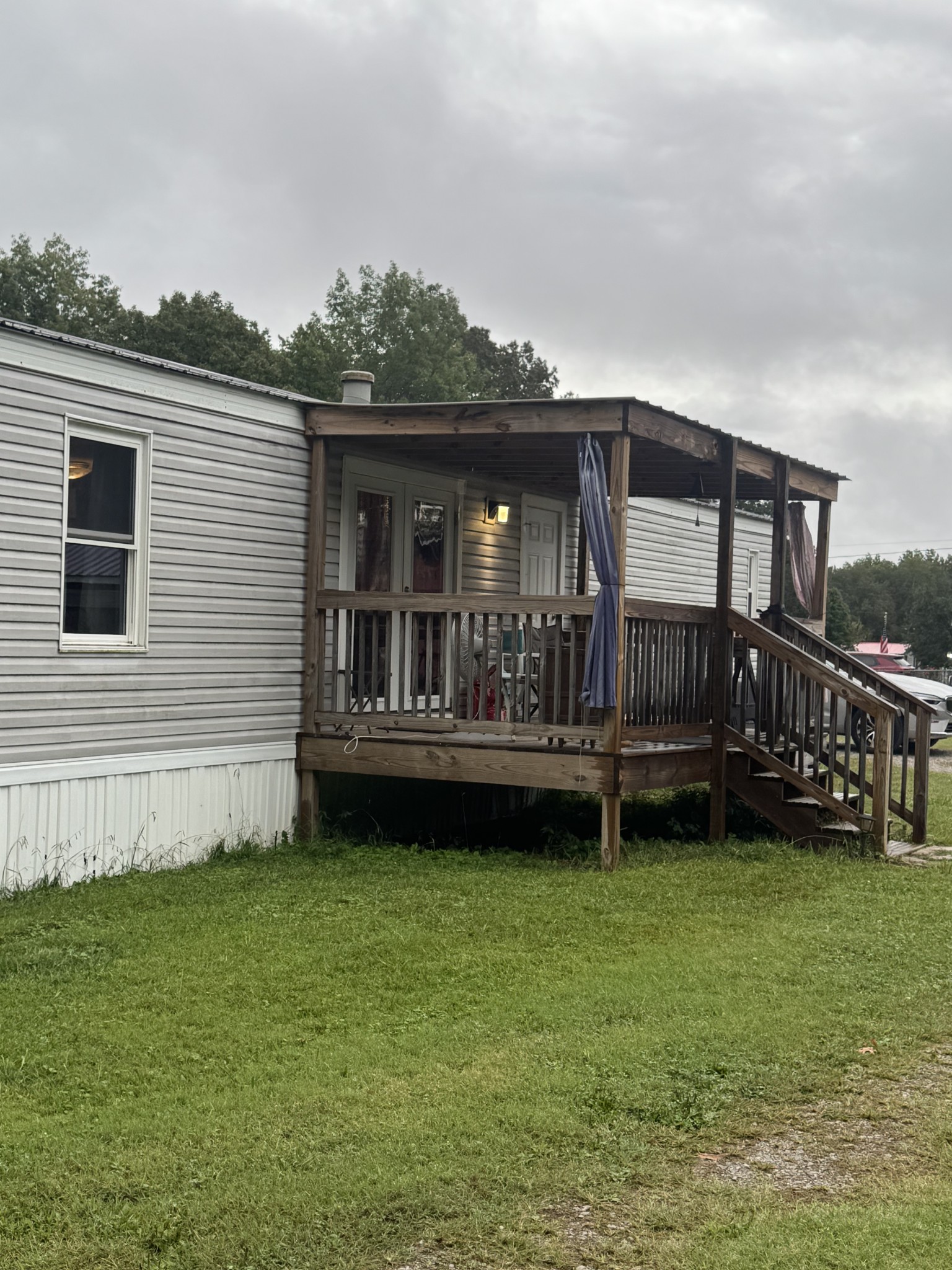79 Sharps Lane Beechgrove, TN 37018 - Photo 21 of 29 a view of a house with a yard and sitting area