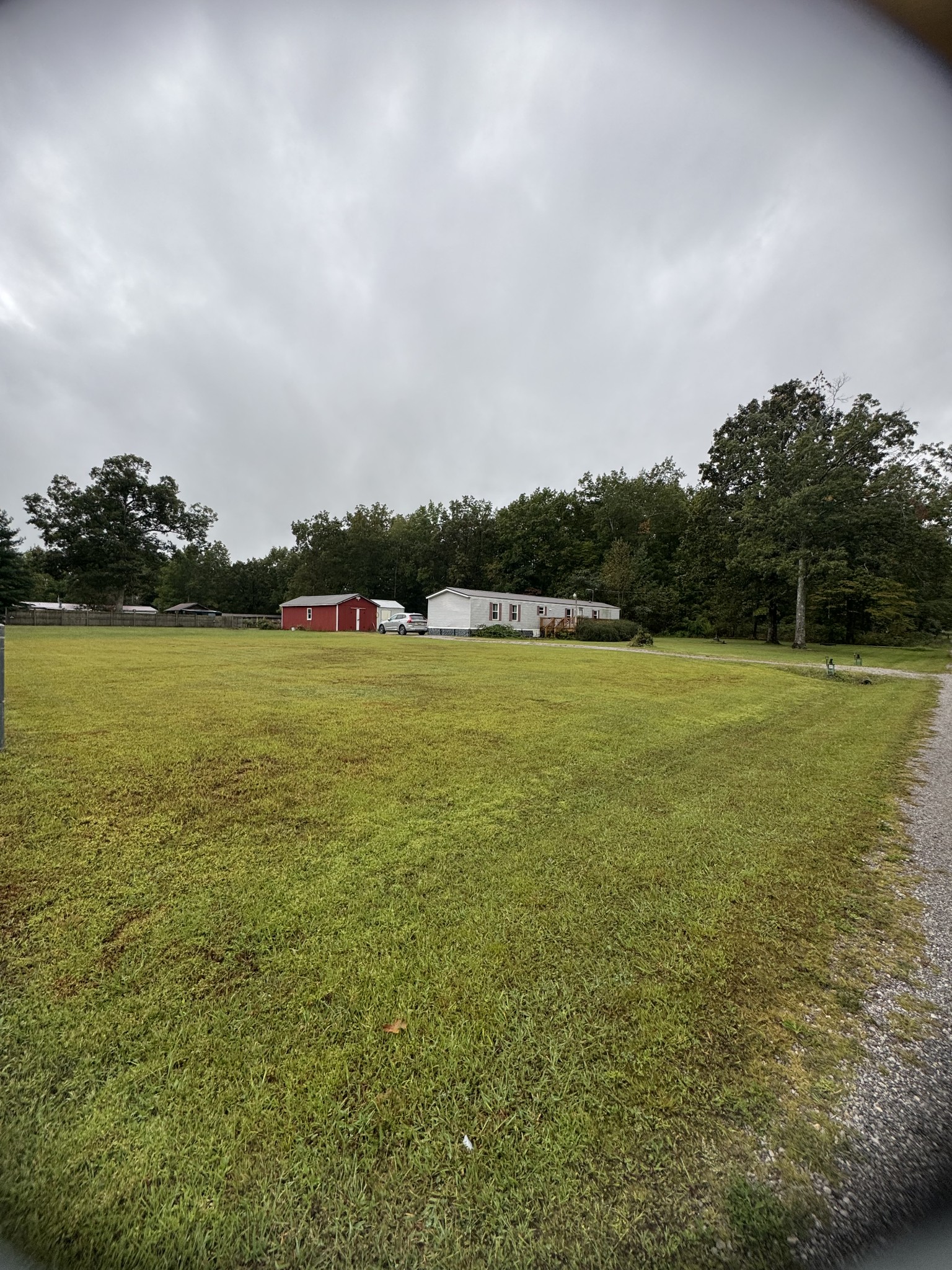 79 Sharps Lane Beechgrove, TN 37018 - Photo 26 of 29 a view of a lake with houses in the back