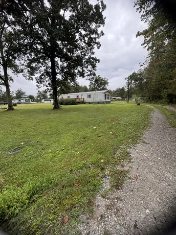 a view of outdoor space and yard