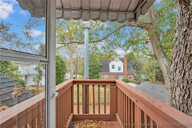 a view of a street from a balcony