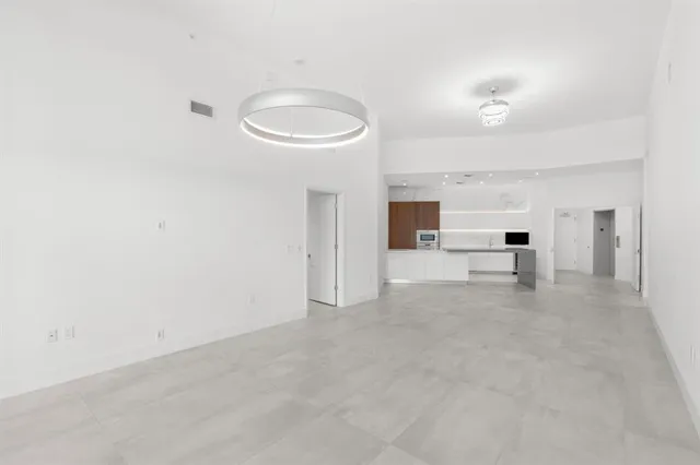 a view of a room with an empty space