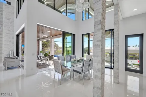 a view of a livingroom with furniture and windows