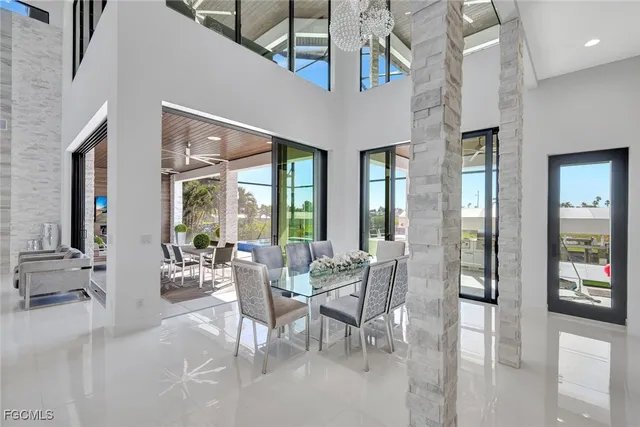 a view of a livingroom with furniture and windows