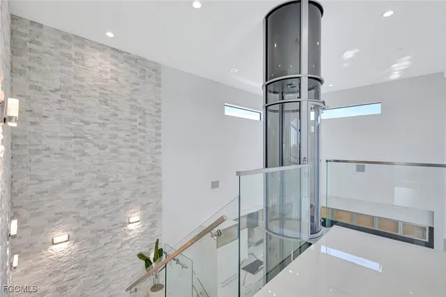 a view of staircase with white walls