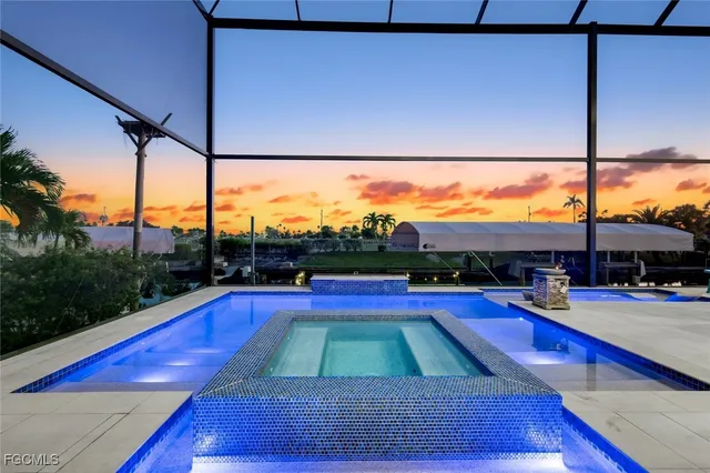 a view of a swimming pool with a balcony