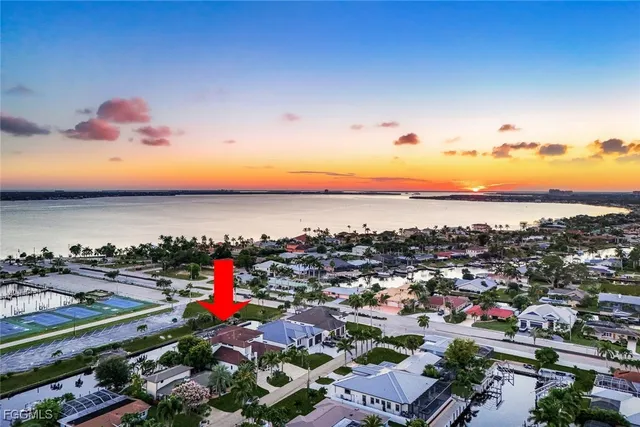 a view of a swimming pool with a lounge chairs