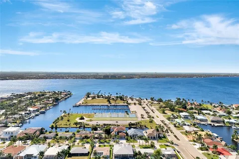 a balcony with furniture and a garden