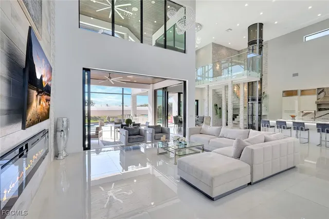 a living room with fireplace furniture and a flat screen tv