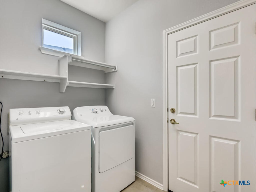 303 Bonham Loop Georgetown, TX 78633 - Photo 11 of 12 Laundry Room Washer and Dryer Convey