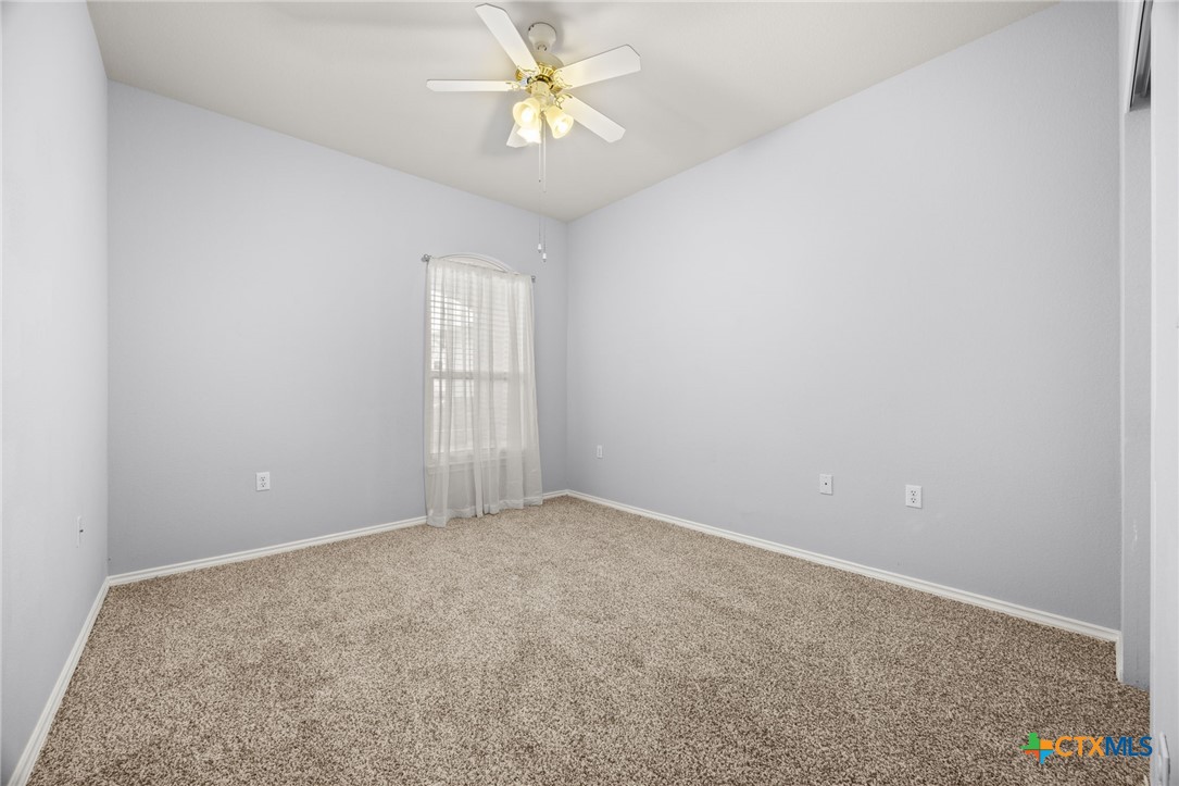 303 Bonham Loop Georgetown, TX 78633 - Photo 9 of 12 Second Bedroom with Ceiling Fan