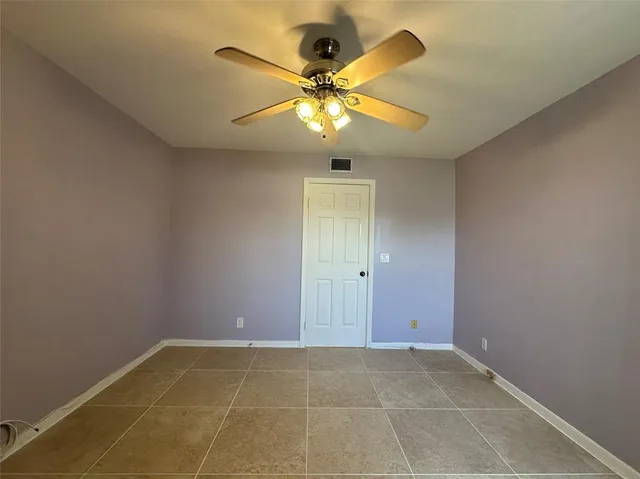 a view of a park with palm trees