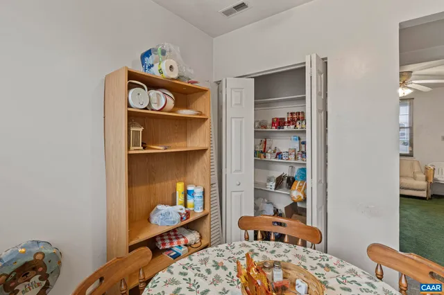 a bedroom with bed and a closet