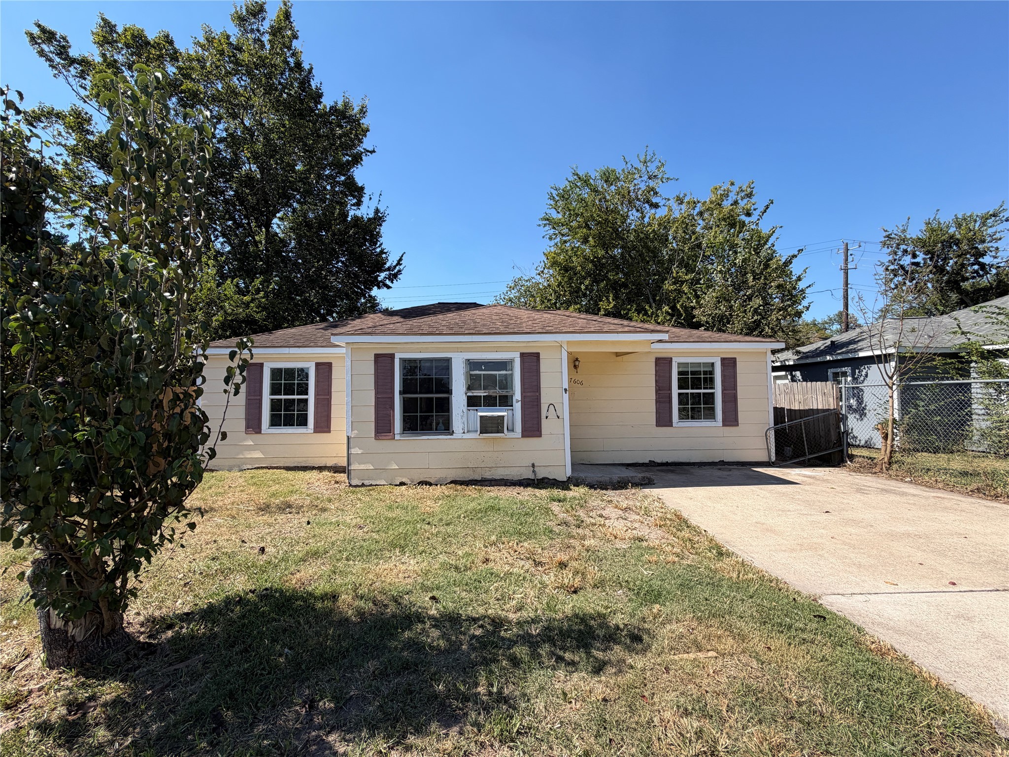 7606 Darnay Drive Houston, TX 77033 - Photo 2 of 11 a front view of a house with a yard
