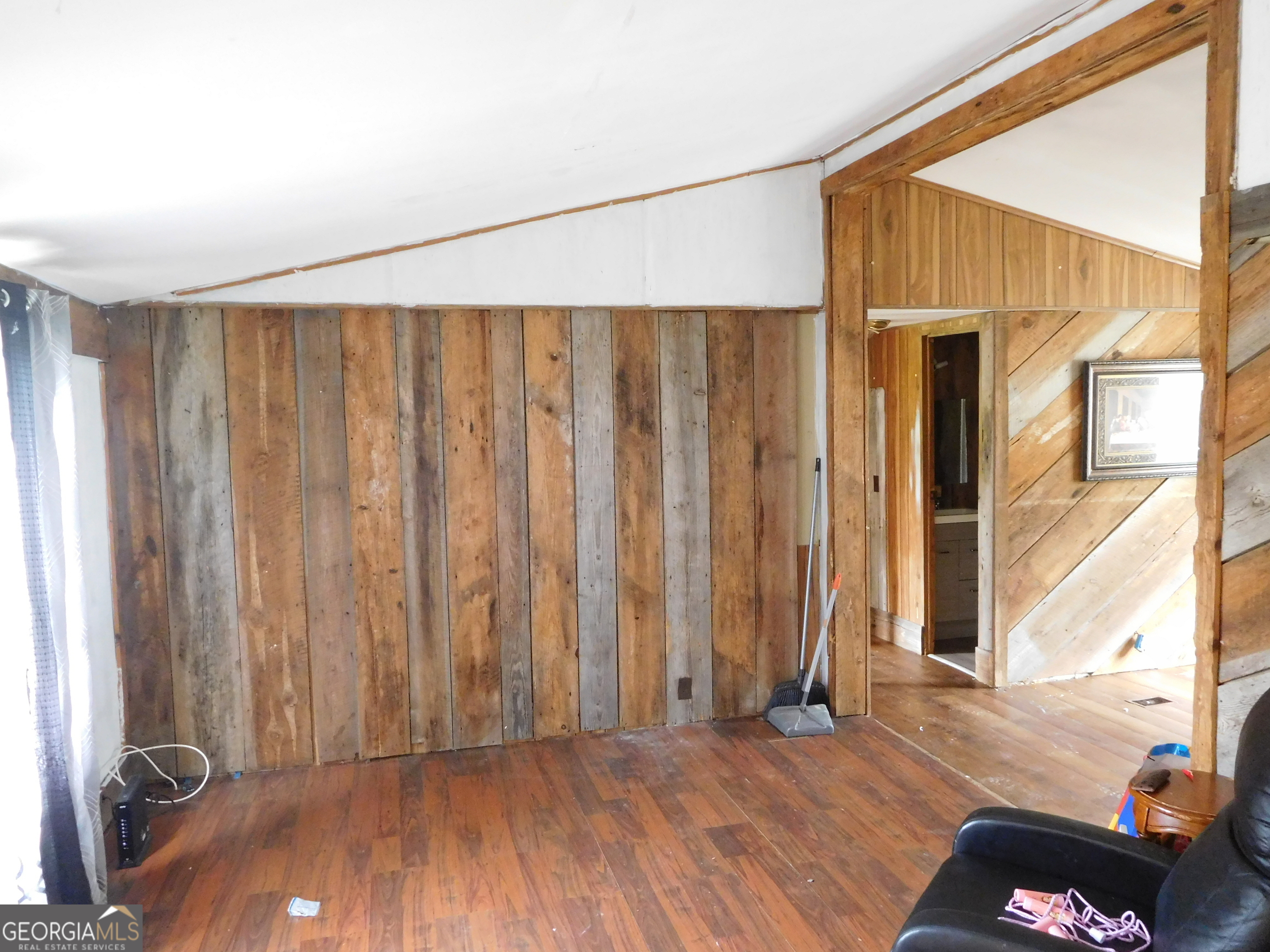 142 Ellis Road Southeast Rome, GA 30161 - Photo 7 of 21 a view of a room with wooden floor and stairs