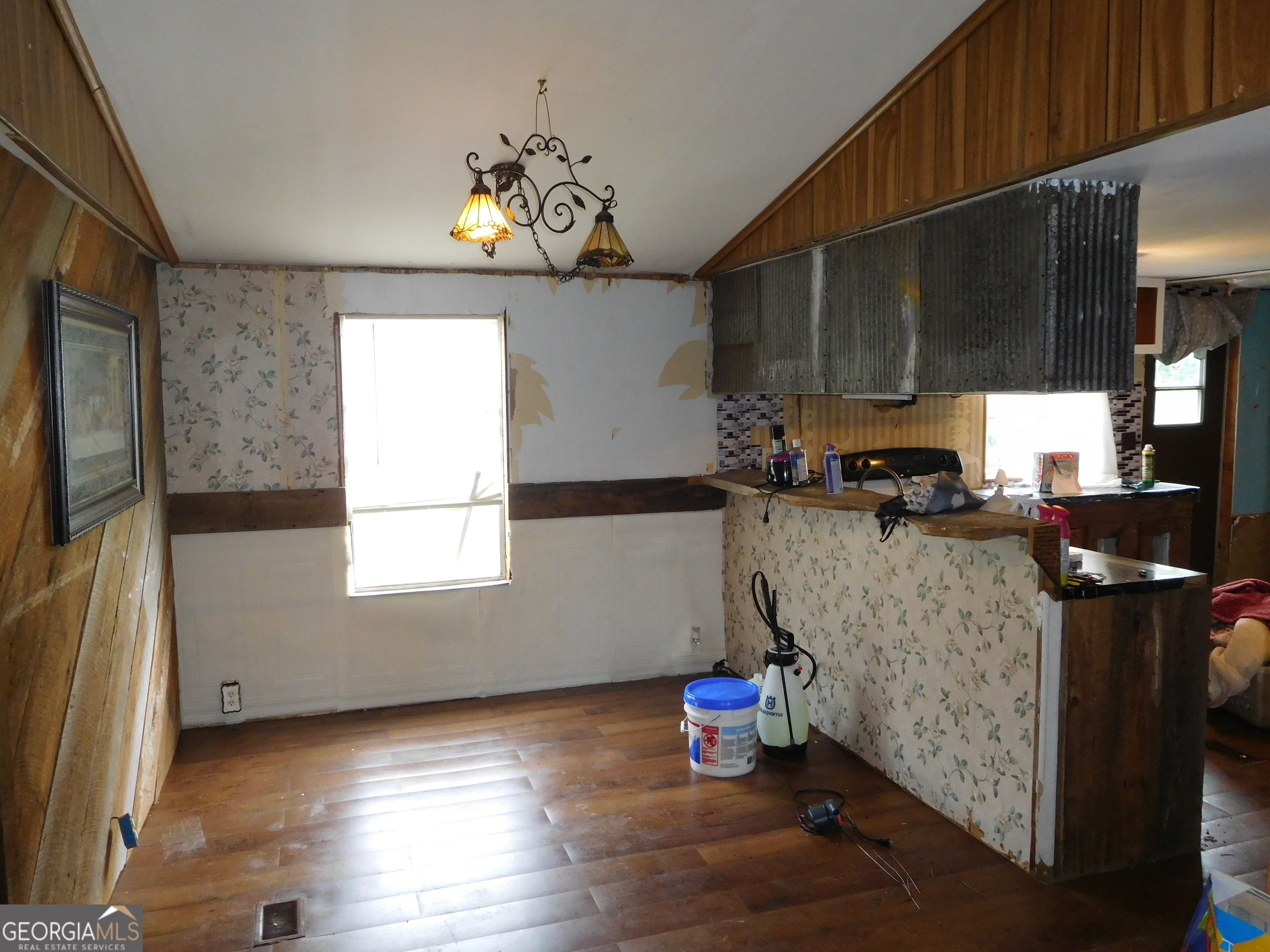 142 Ellis Road Southeast Rome, GA 30161 - Photo 9 of 21 a kitchen with stainless steel appliances granite countertop a sink window and cabinets