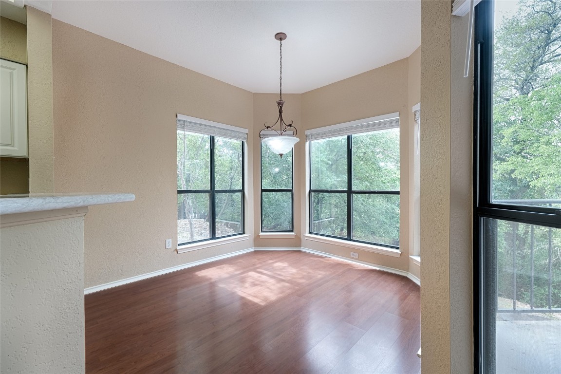 4711 Spicewood Springs Road, Unit 173 Austin, TX 78759 - Photo 5 of 19 a view of an empty room with a window