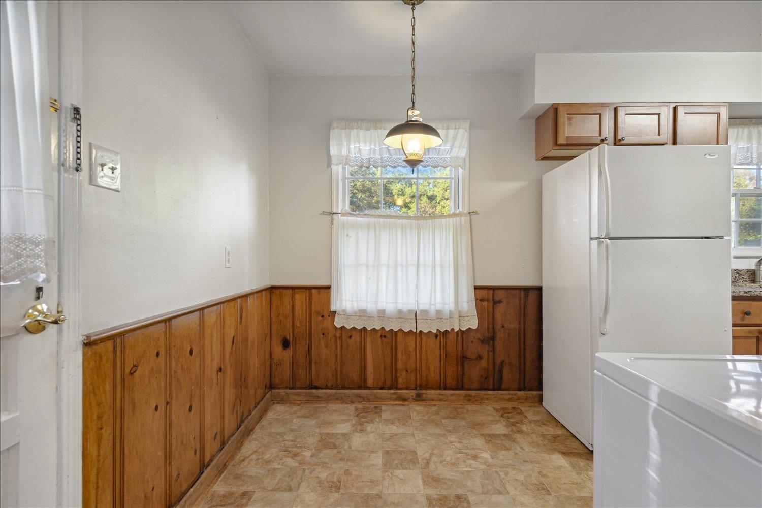 1072 Ivy Road Memphis, TN 38117 - Photo 14 of 35 a view of a hallway to rooms and wooden floor