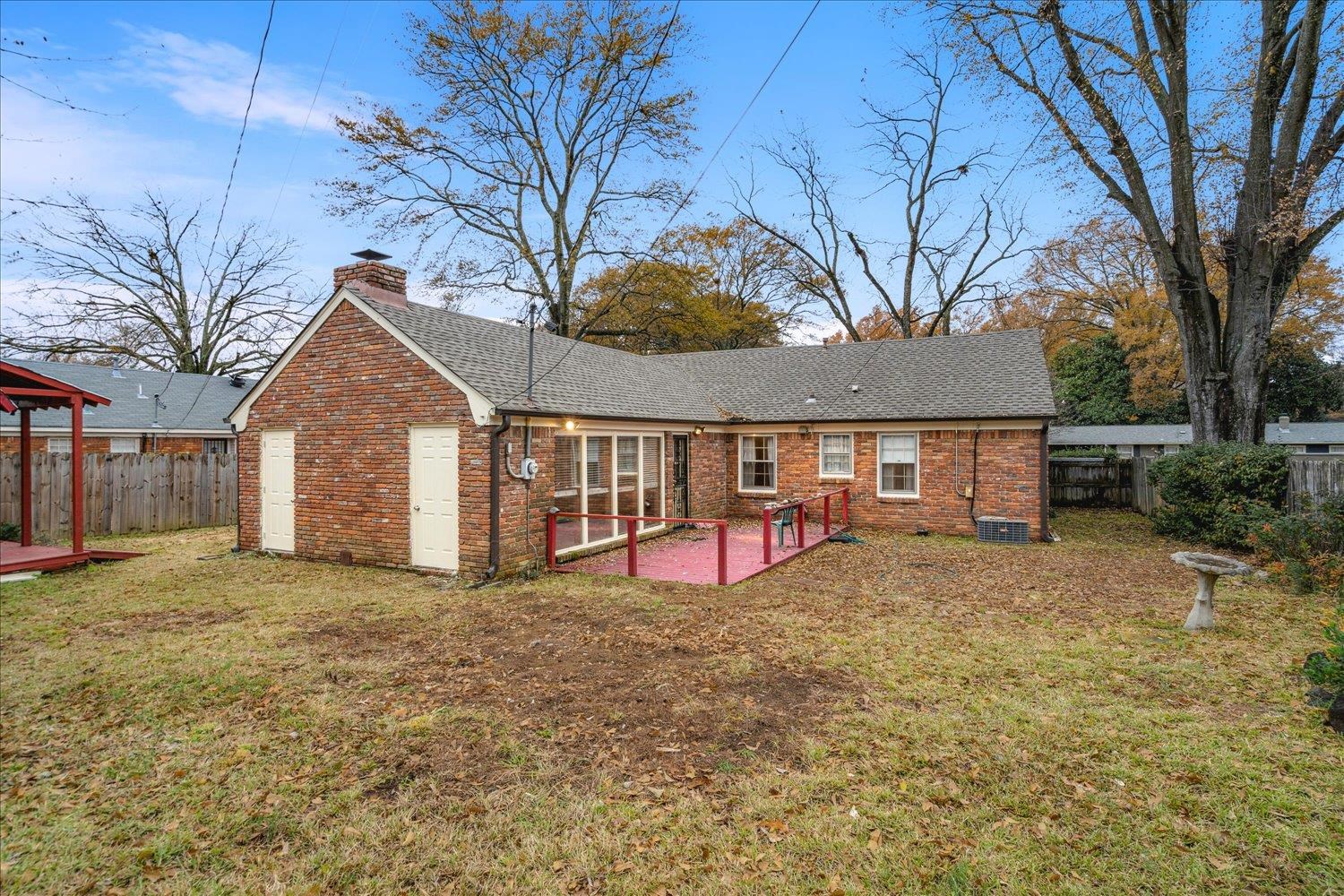 1072 Ivy Road Memphis, TN 38117 - Photo 31 of 35 a view of a house with a yard covered in snow