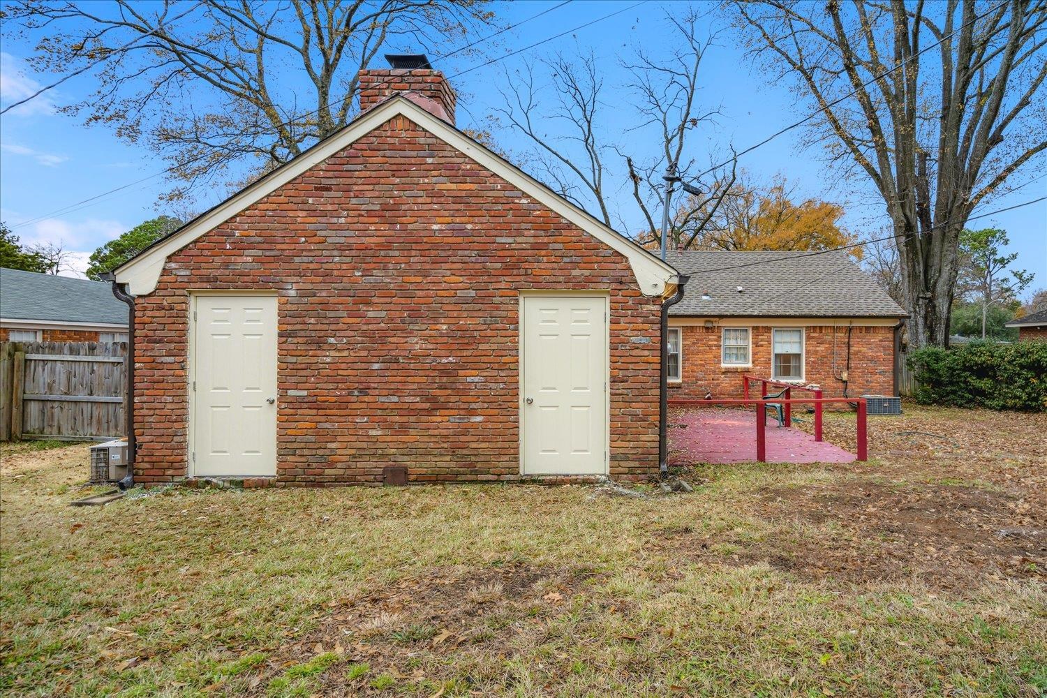 1072 Ivy Road Memphis, TN 38117 - Photo 32 of 35 a front view of house with an outdoor space