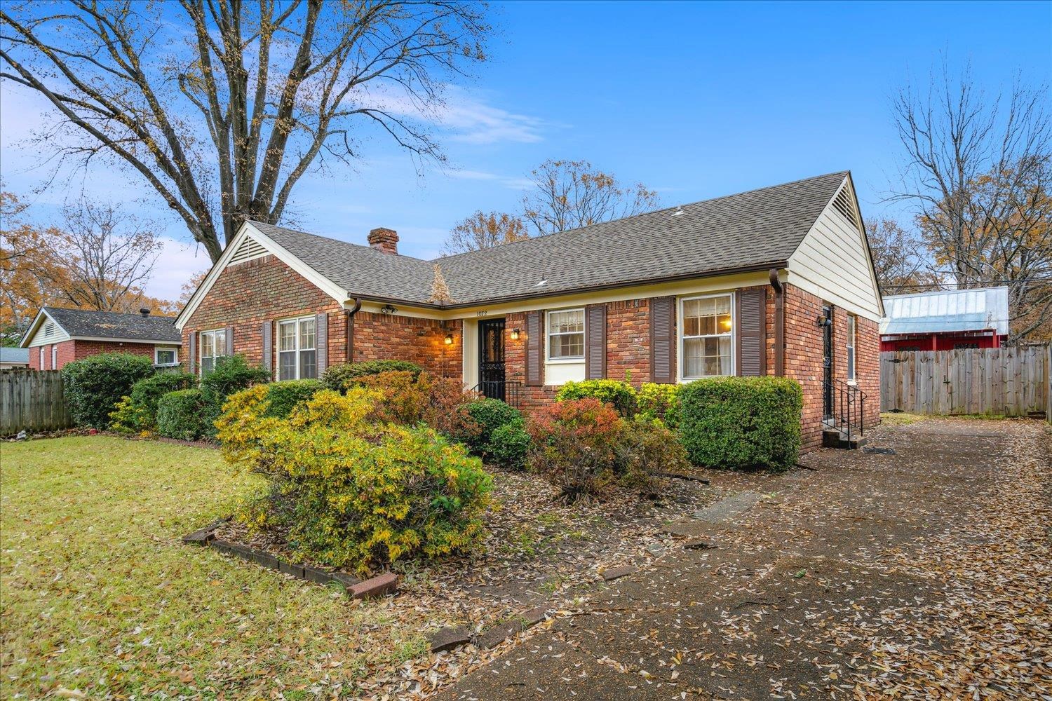 1072 Ivy Road Memphis, TN 38117 - Photo 4 of 35 a view of a front of house with a yard