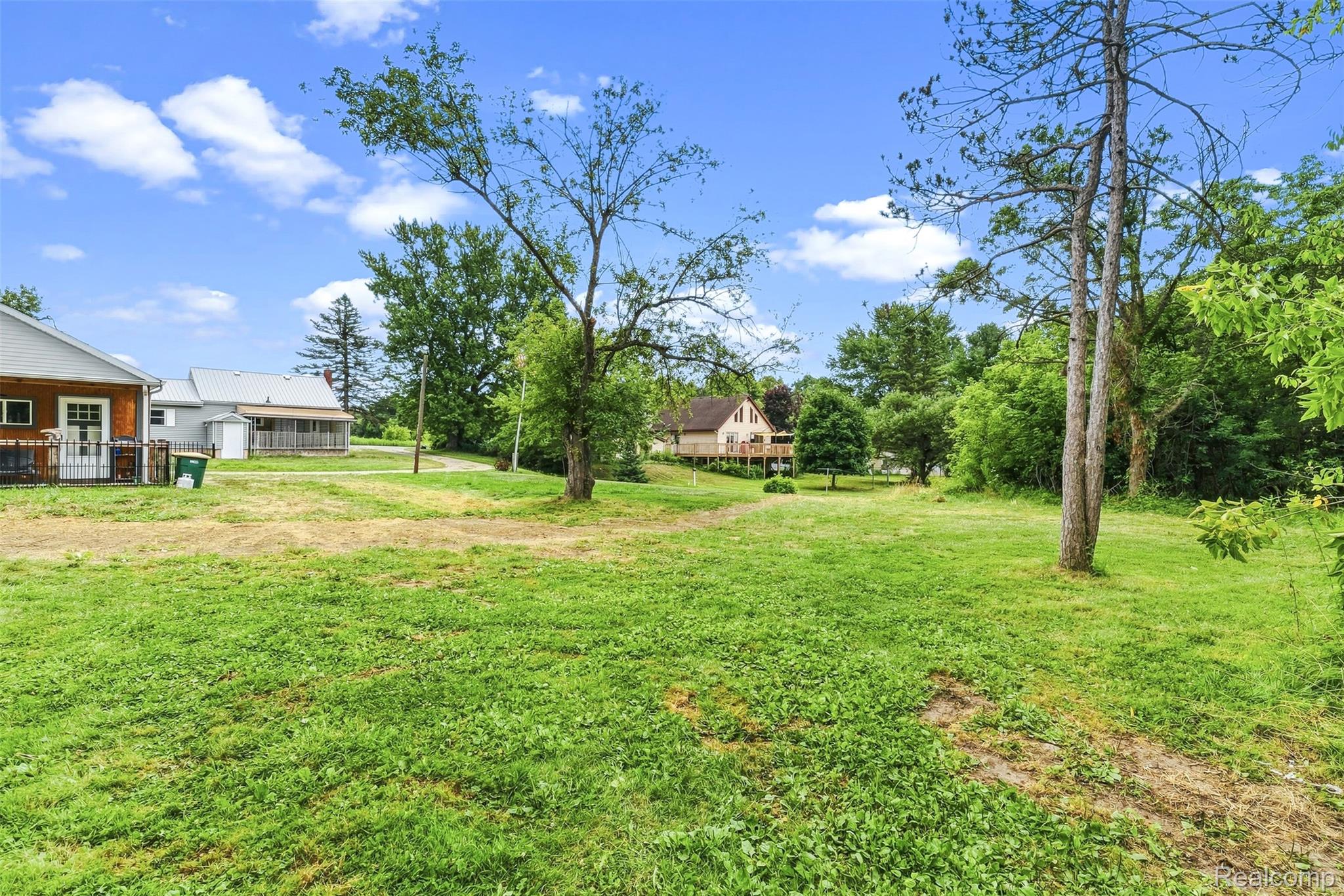 6163 North State Road Davison, MI 48423 - Photo 31 of 45 Expansive grassy lot with mature trees