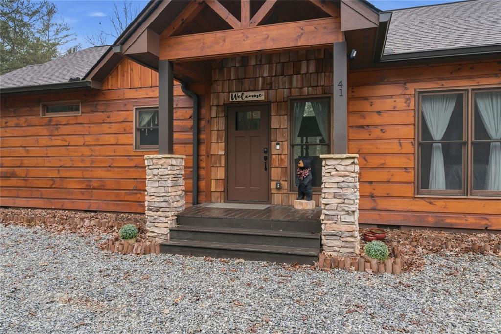41 Bunks Way Morganton, GA 30560 - Photo 3 of 33 a view of brick house with large windows