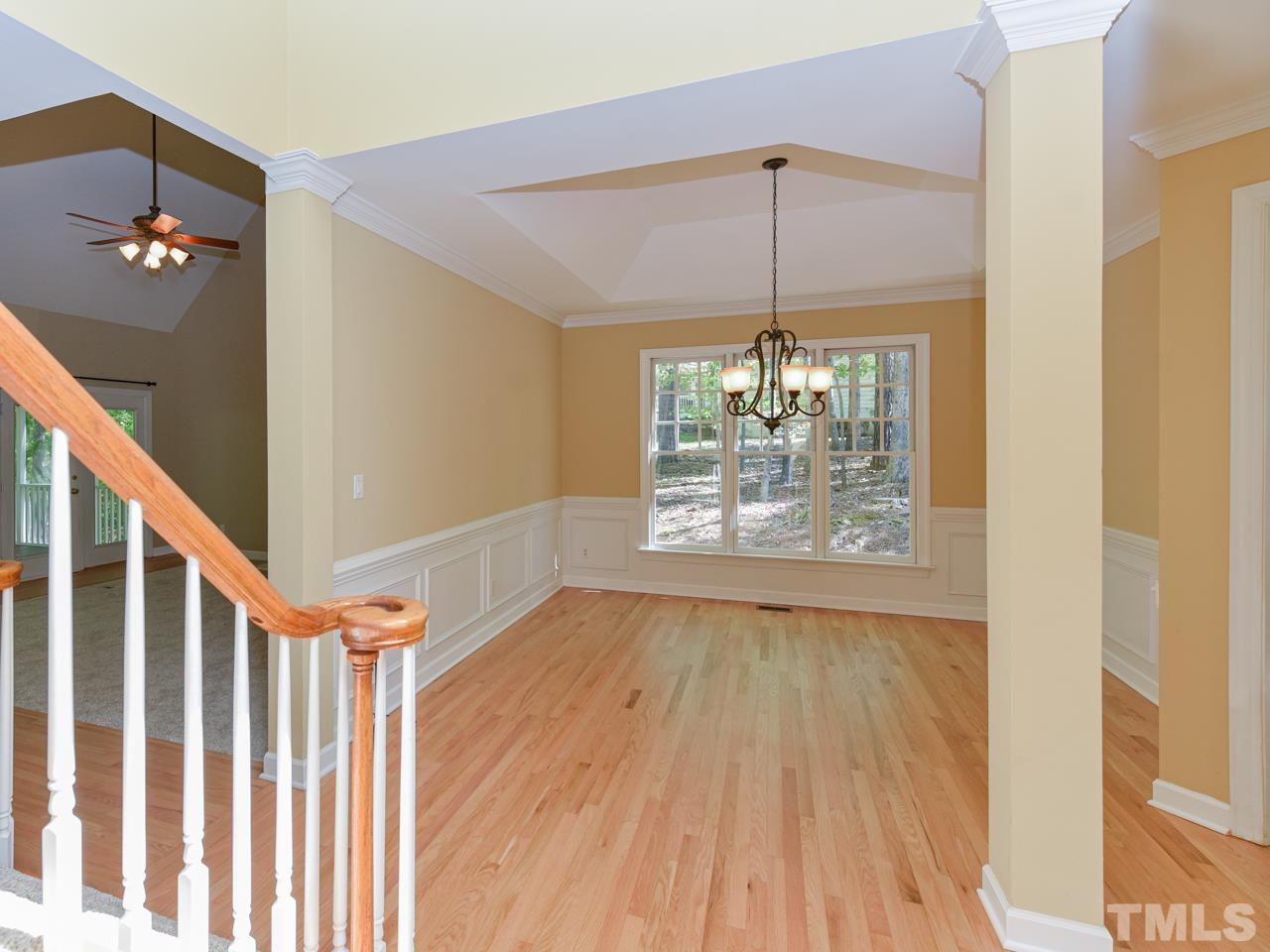 5820 Orchid Valley Road Raleigh, NC 27613 - Photo 13 of 31 a view of entryway and hall with wooden floor