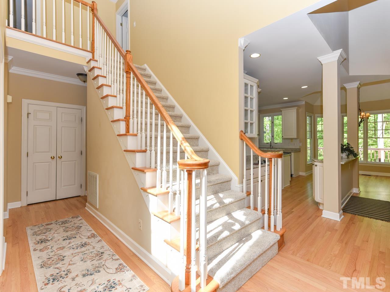 5820 Orchid Valley Road Raleigh, NC 27613 - Photo 17 of 31 a view of entryway and hall with wooden floor