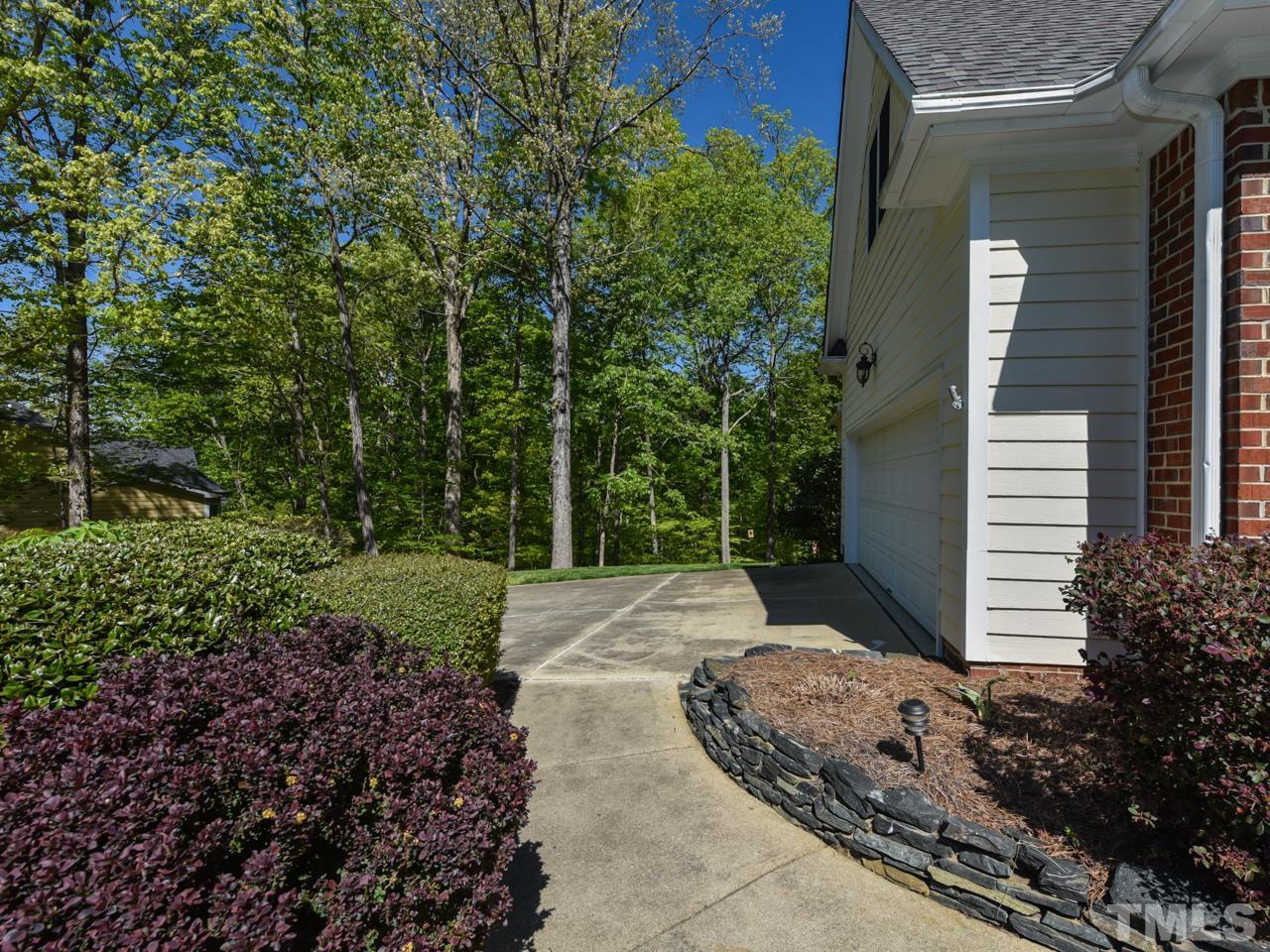 5820 Orchid Valley Road Raleigh, NC 27613 - Photo 2 of 31 a view of a backyard of the house
