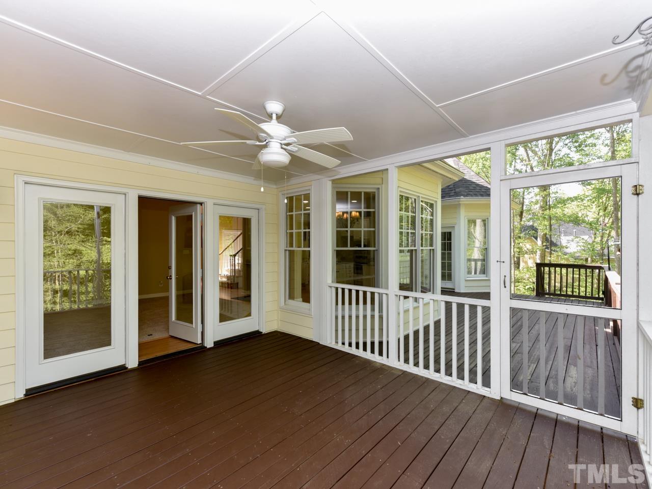 5820 Orchid Valley Road Raleigh, NC 27613 - Photo 25 of 31 an empty room with wooden floor and windows