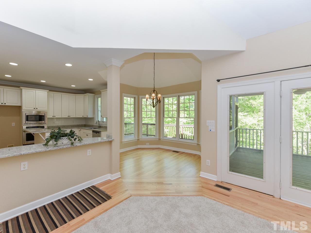 5820 Orchid Valley Road Raleigh, NC 27613 - Photo 9 of 31 a view of a kitchen with a sink and cabinets
