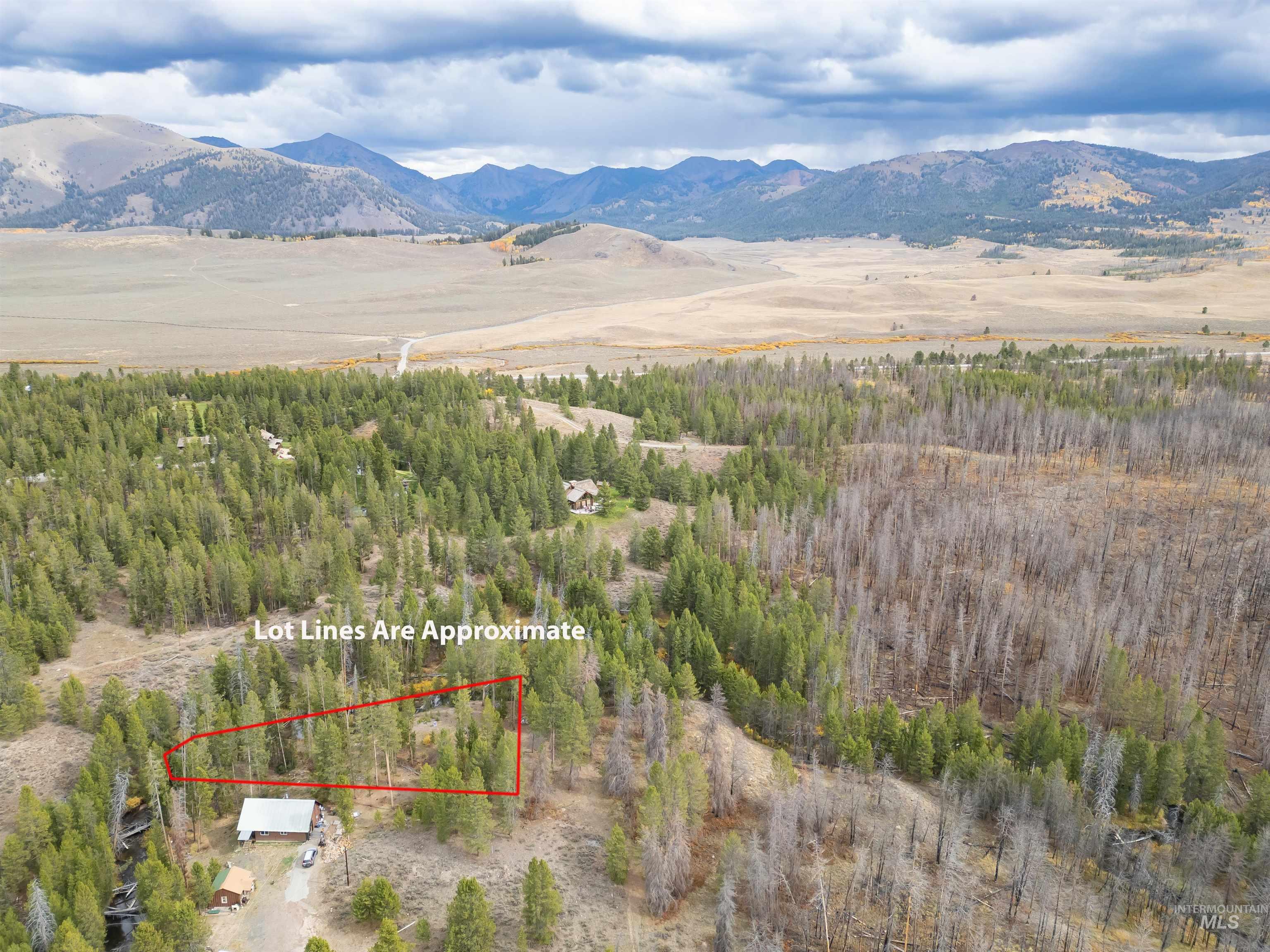773 Smiley Creek Road Ketchum, ID 83340 - Photo 18 of 27 Aerial view of property's location featuring a mountain backdrop and property boundaries highlighted