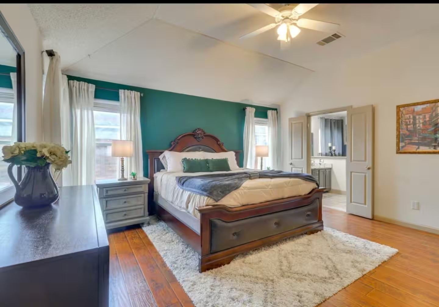 1305 Marigold Way Pflugerville, TX 78660 - Photo 12 of 22 a living room with a bed furniture and a potted plant