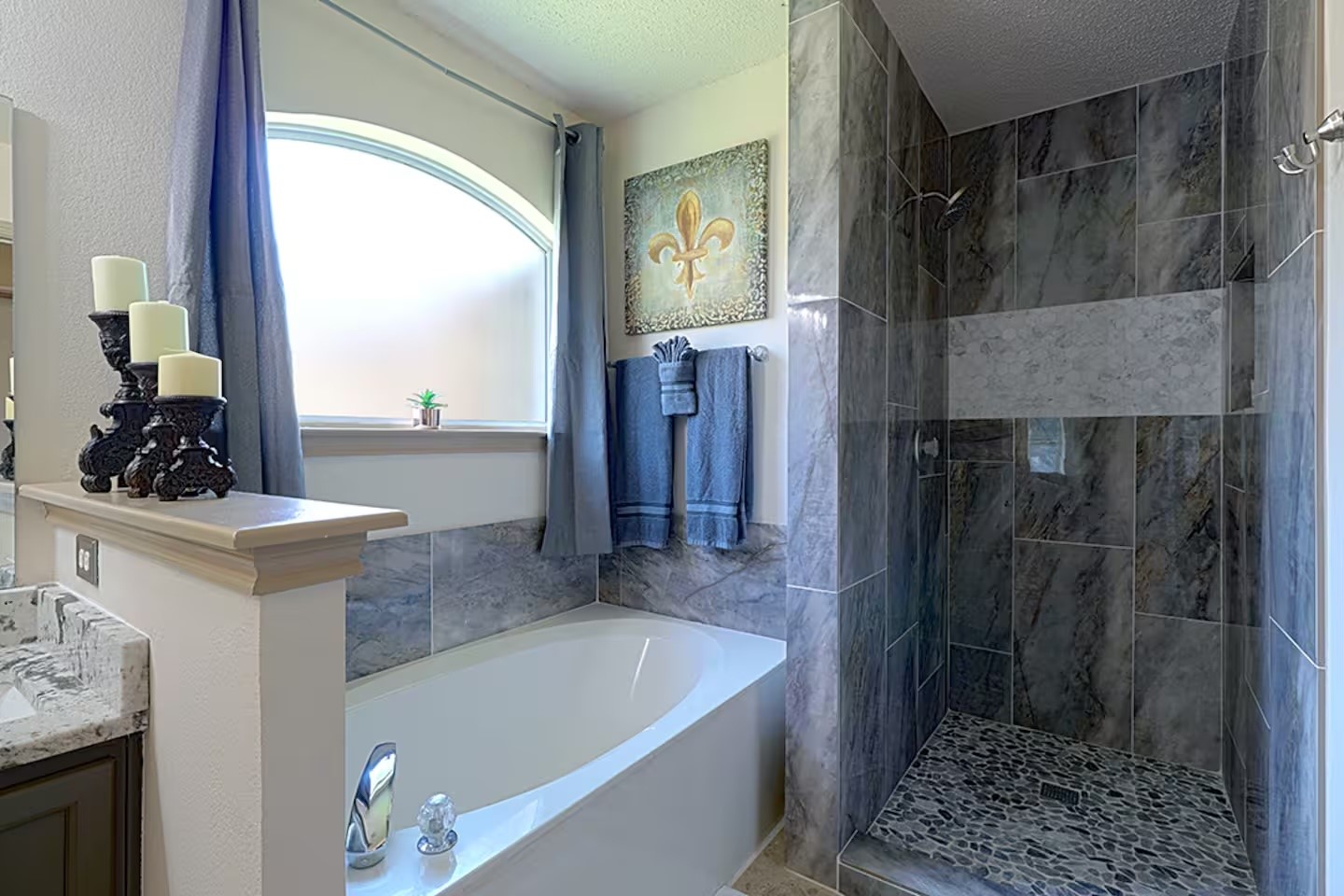 1305 Marigold Way Pflugerville, TX 78660 - Photo 18 of 22 a bath room with a bath tub and a shower