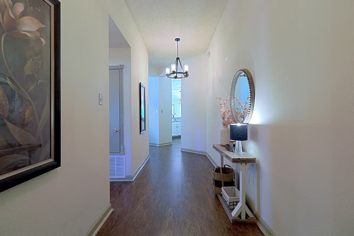 1305 Marigold Way Pflugerville, TX 78660 - Photo 20 of 22 a view of a room with gym equipment and wooden floor