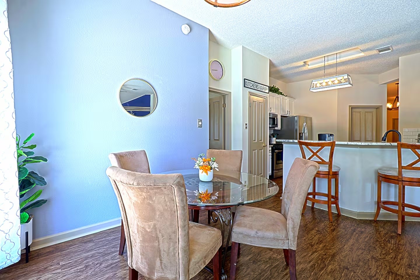 1305 Marigold Way Pflugerville, TX 78660 - Photo 6 of 22 a view of a dining room with furniture and wooden floor
