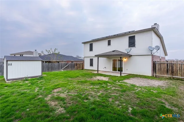 a big house with a big yard and more windows