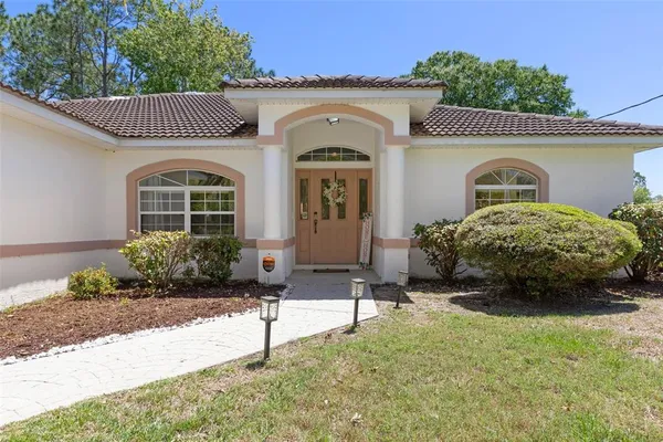 $310,000 | 29 Princess Kim Lane, Palm Coast, FL 32164