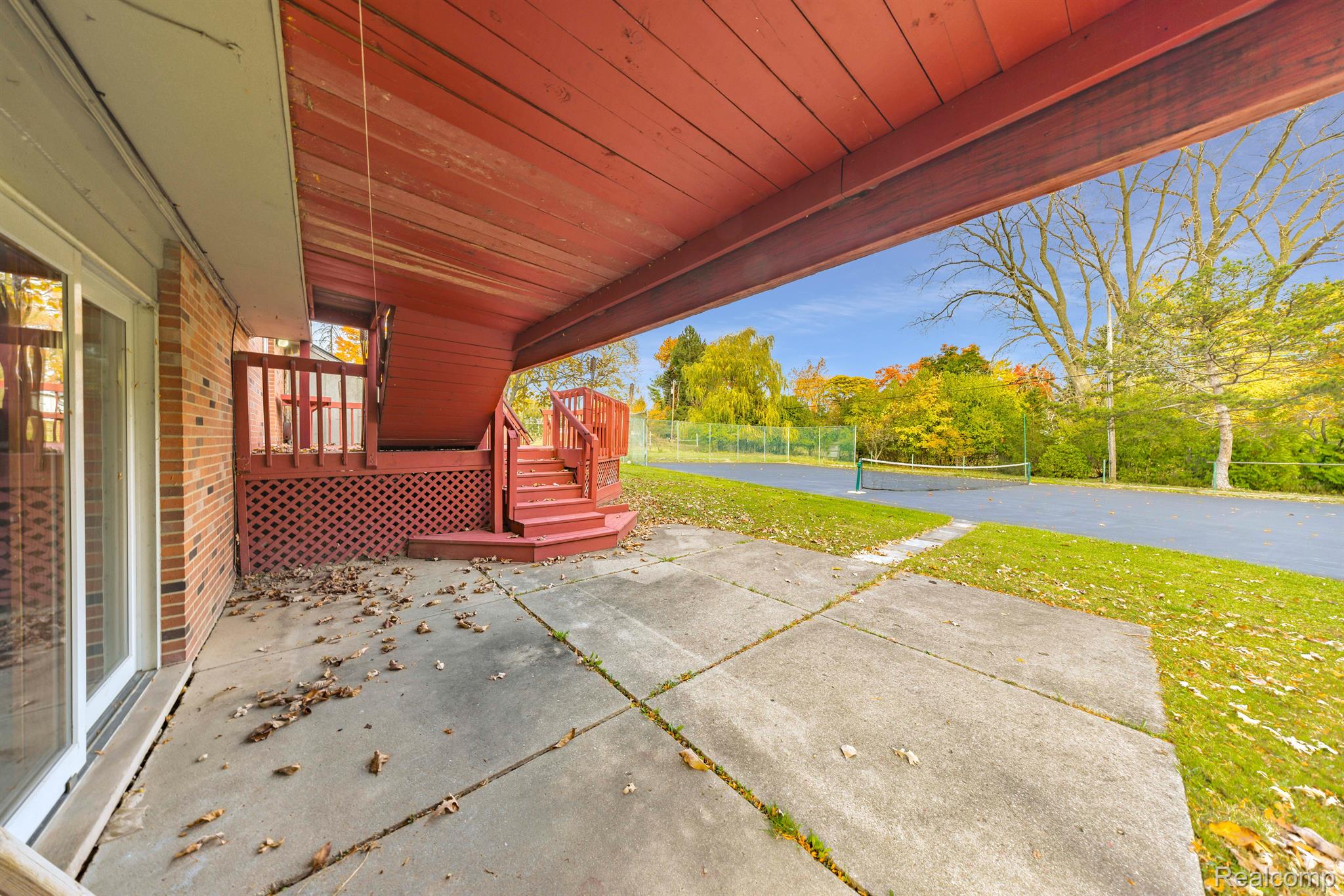 5731 Farmington Road West Bloomfield, MI 48322 - Photo 29 of 54 Covered Patio off Lower Level Family Room