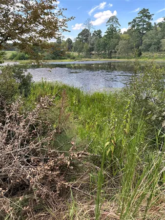 a view of outdoor space with a lake view