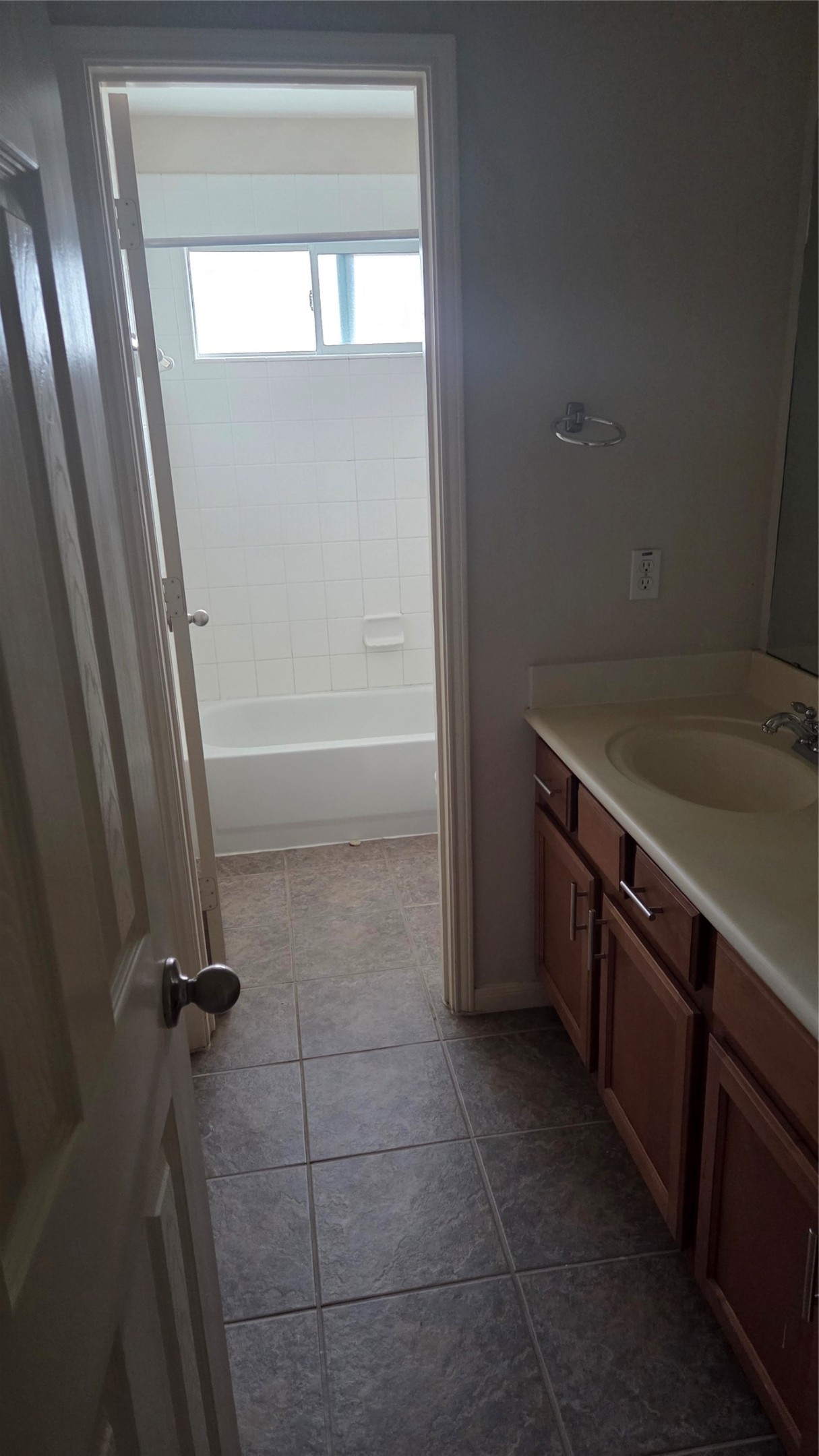 2103 Trinity Manor Lane Richmond, TX 77469 - Photo 21 of 30 a bathroom with a sink a vanity and tub