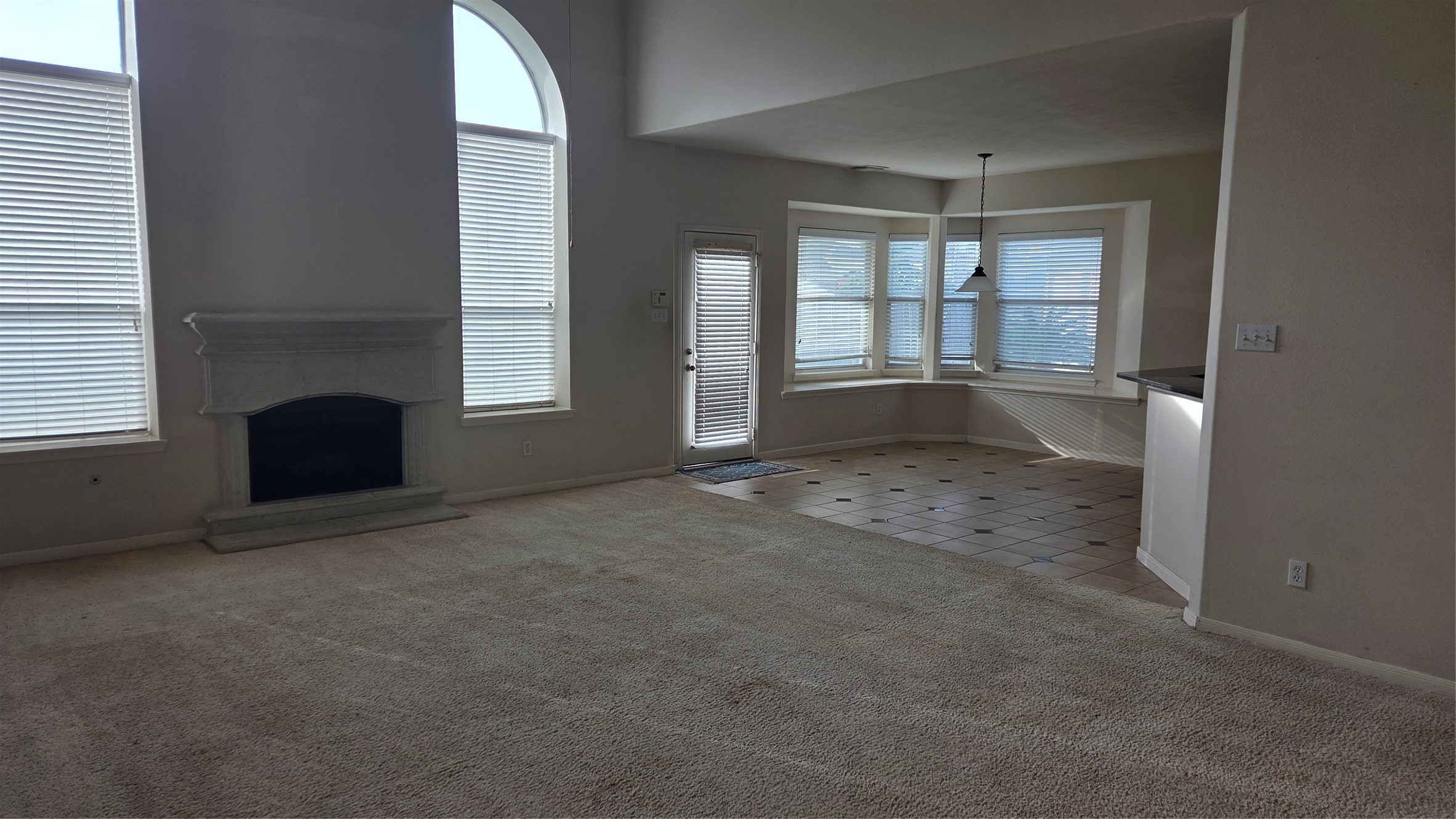 2103 Trinity Manor Lane Richmond, TX 77469 - Photo 24 of 30 an empty room with windows