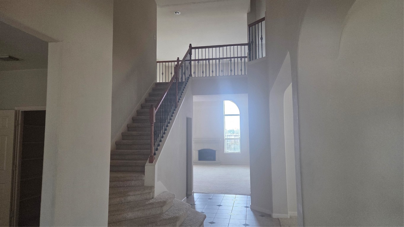 2103 Trinity Manor Lane Richmond, TX 77469 - Photo 10 of 30 a view of entryway and hall with a wooden floor