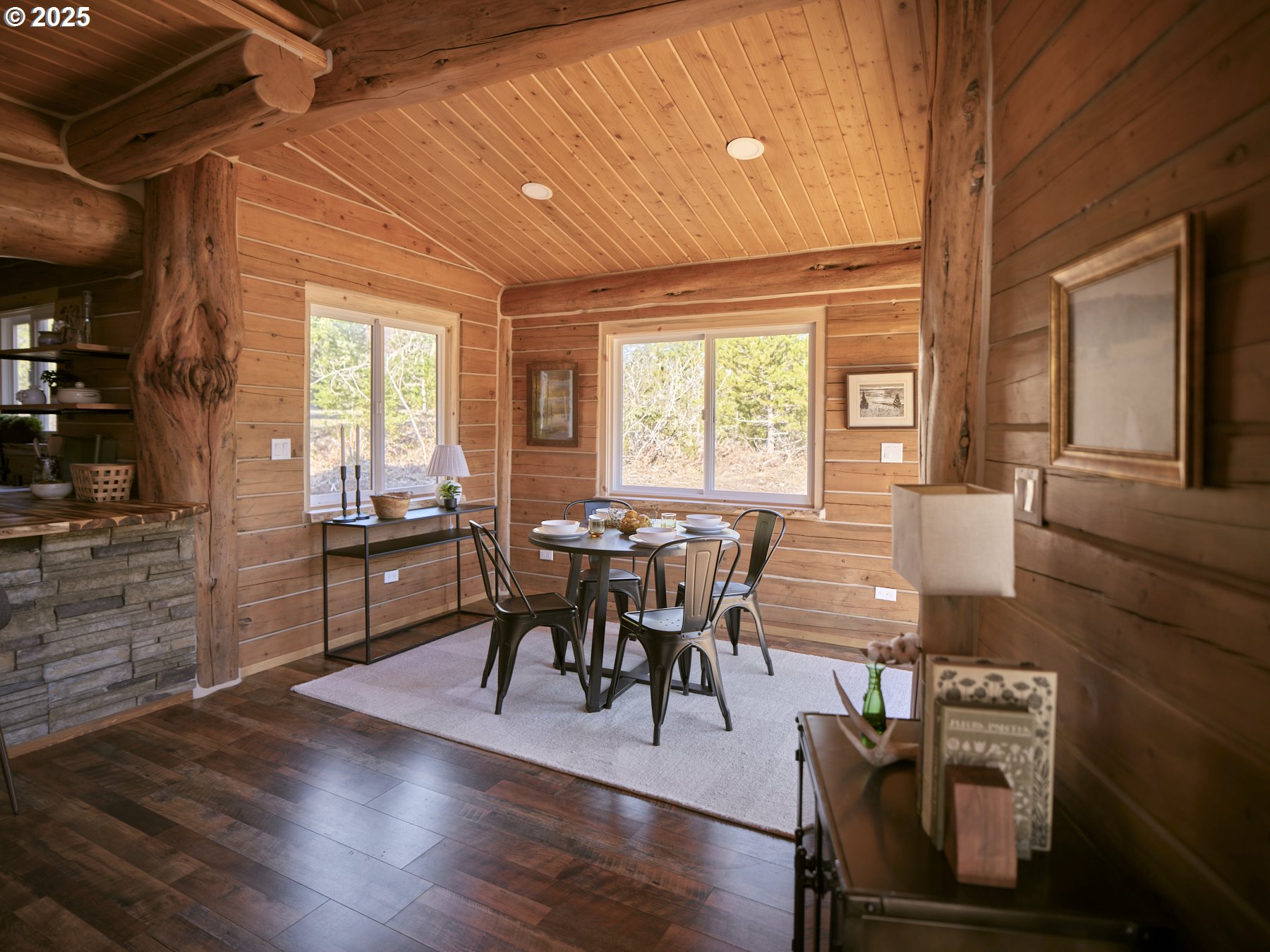 192 Sasquatch Way Cougar, WA 98616 - Photo 13 of 47 a dining room with furniture window wooden floor