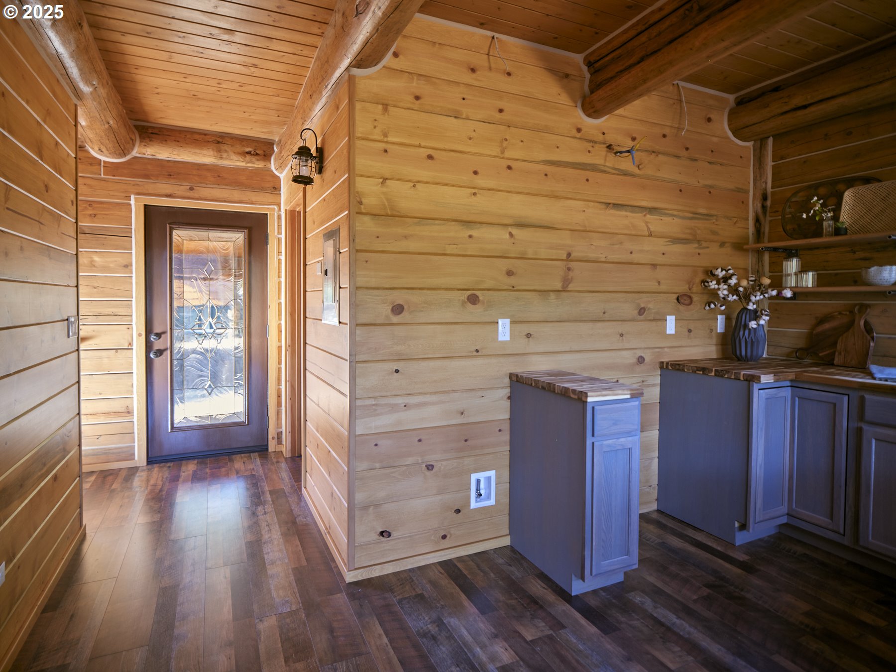 192 Sasquatch Way Cougar, WA 98616 - Photo 18 of 47 a view of a hallway with wooden floor and staircase