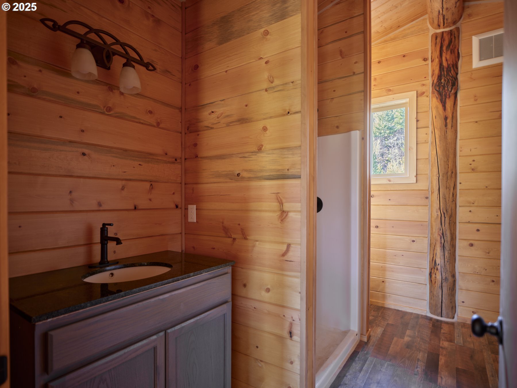 192 Sasquatch Way Cougar, WA 98616 - Photo 30 of 47 a bathroom with a sink and vanity