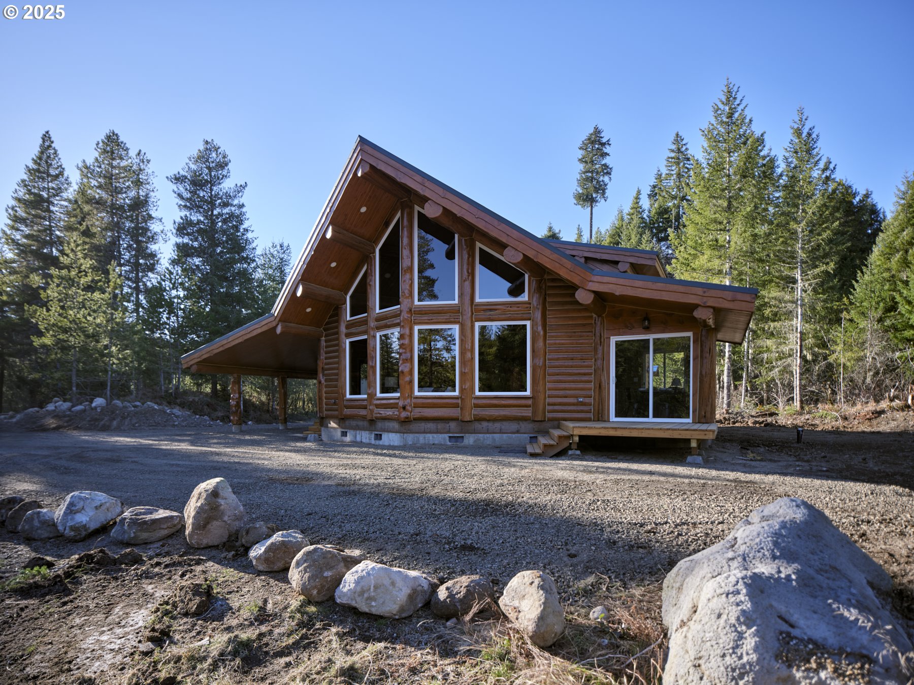 192 Sasquatch Way Cougar, WA 98616 - Photo 5 of 47 a front view of a house with a yard