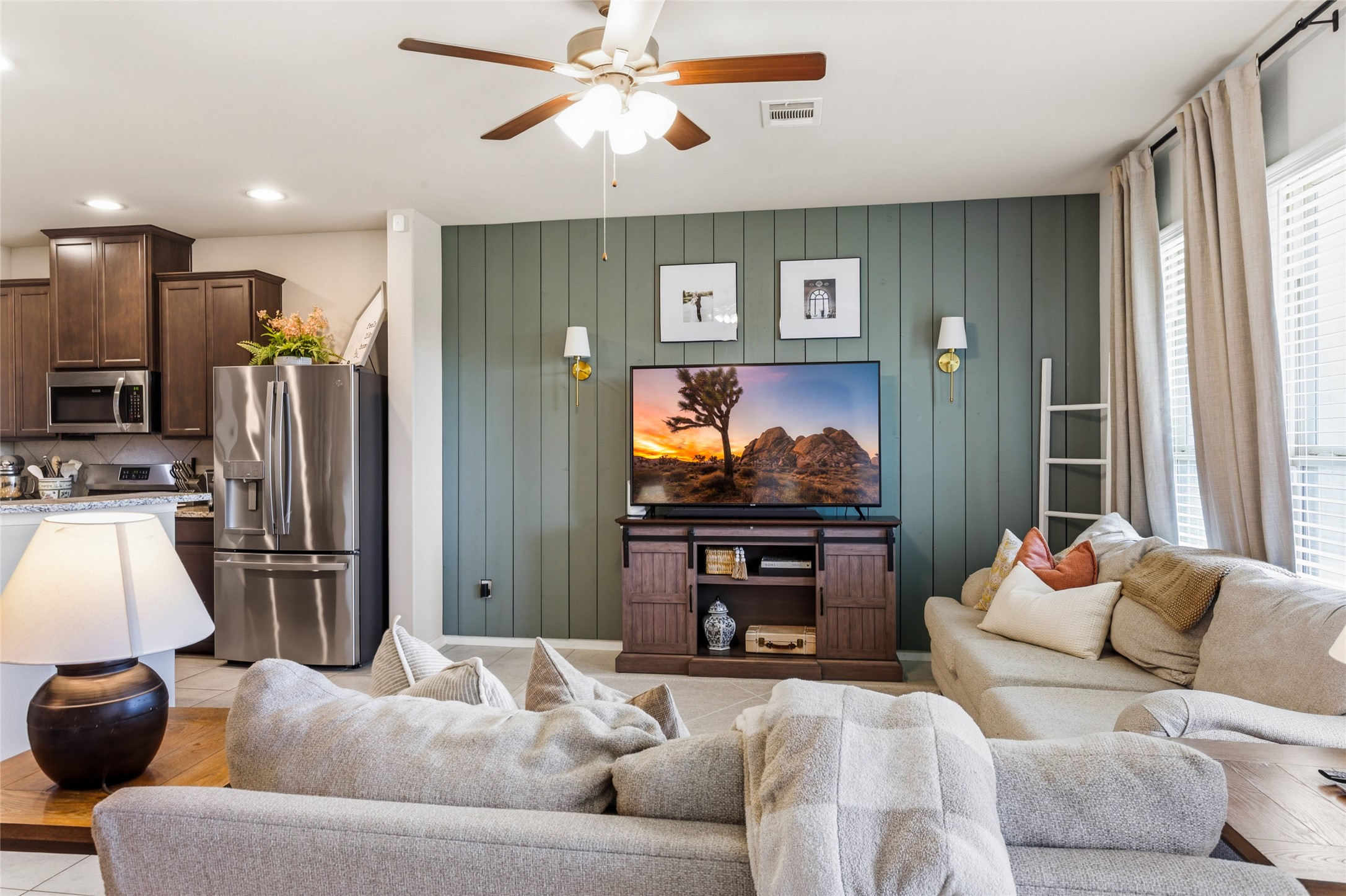 7254 Victorville Drive Rosharon, TX 77583 - Photo 4 of 27 a living room with furniture and a flat screen tv